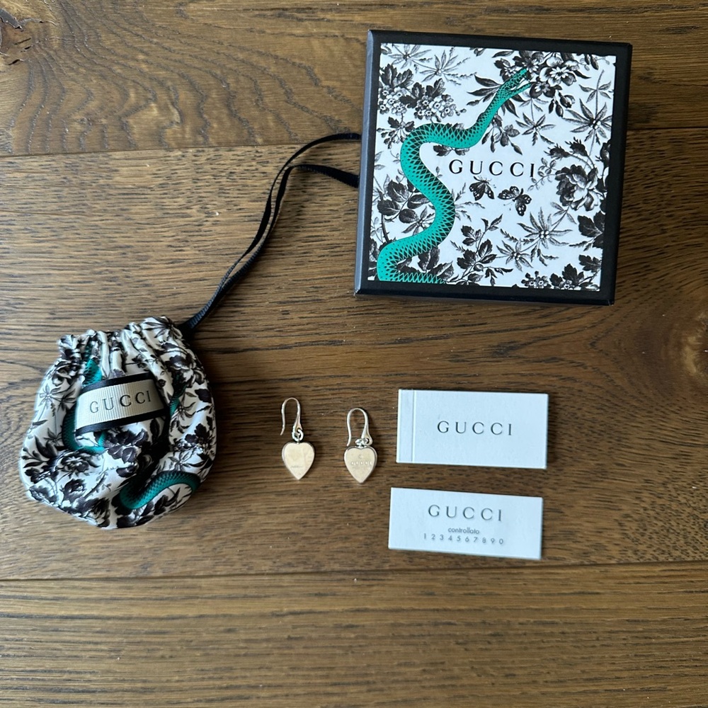 GUCCI authentic heart dangle earrings in silver